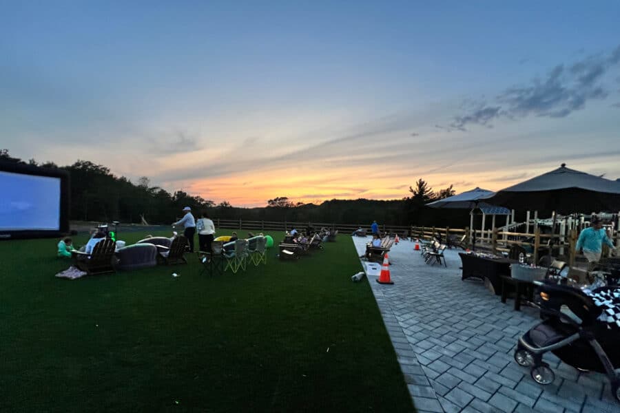 Setting up for a movie night on the great lawn