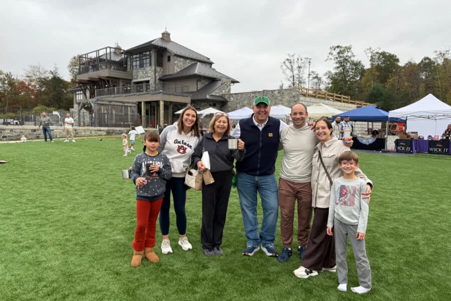 Members enjoying activities on the great lawn